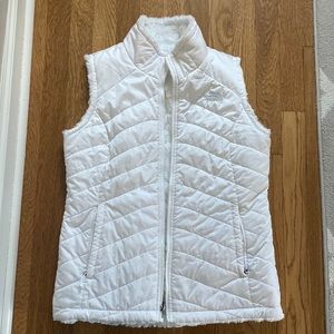 White ladies north face reversible vest size M
